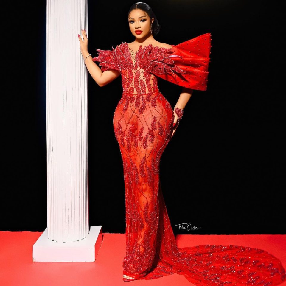 Rebecca Nengi Hampson in a red lace dress styled by Medlin Boss