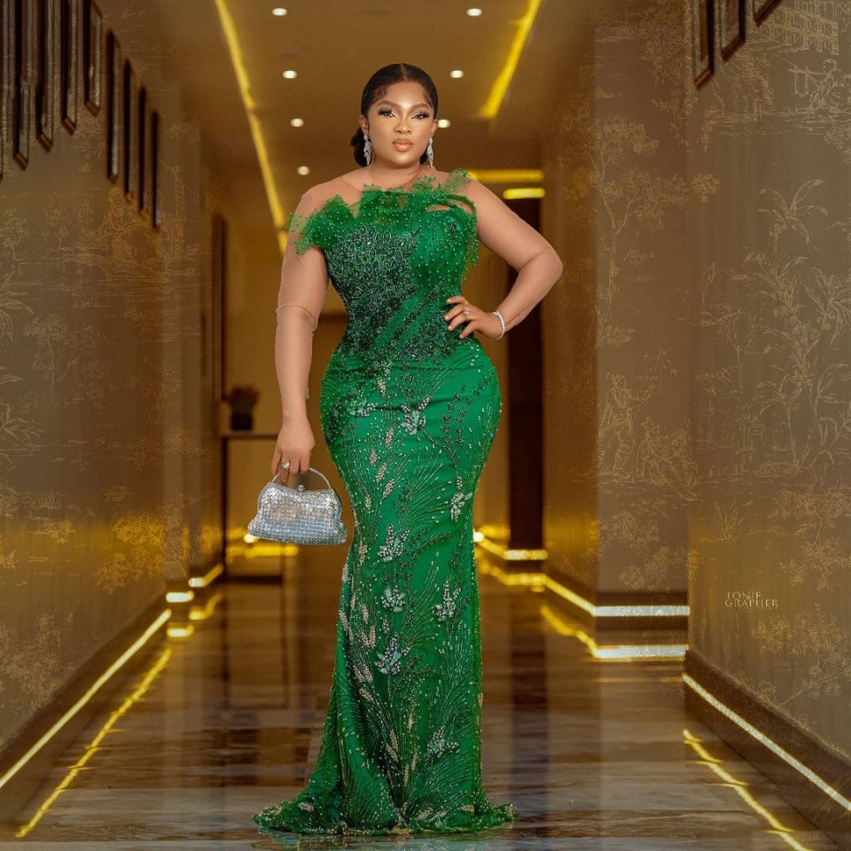 Actress Regina Chukwu in an elegant green lace dress