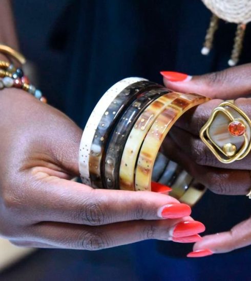 Ankole Luxury creative director Veronica Gakio shows bangles at the workshop in Nairobi.