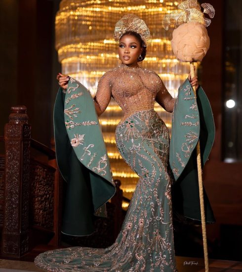 Nigerian fashion designer Veekee James in a bell sleeve lace dress