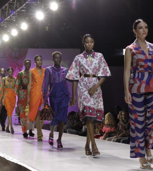 Models present creations during the Swahili Fashion Week in Dar es Salaam, Tanzania on Dec. 2, 2022.