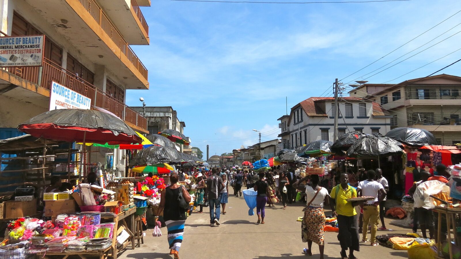 Wander the vibrant streets of Freetown, where bustling markets, colorful buildings, and lively music create a tapestry of urban life in Sierra Leone. #FreetownVibes #SierraLeone. Photo Credits: Erik Cleves Kristensen