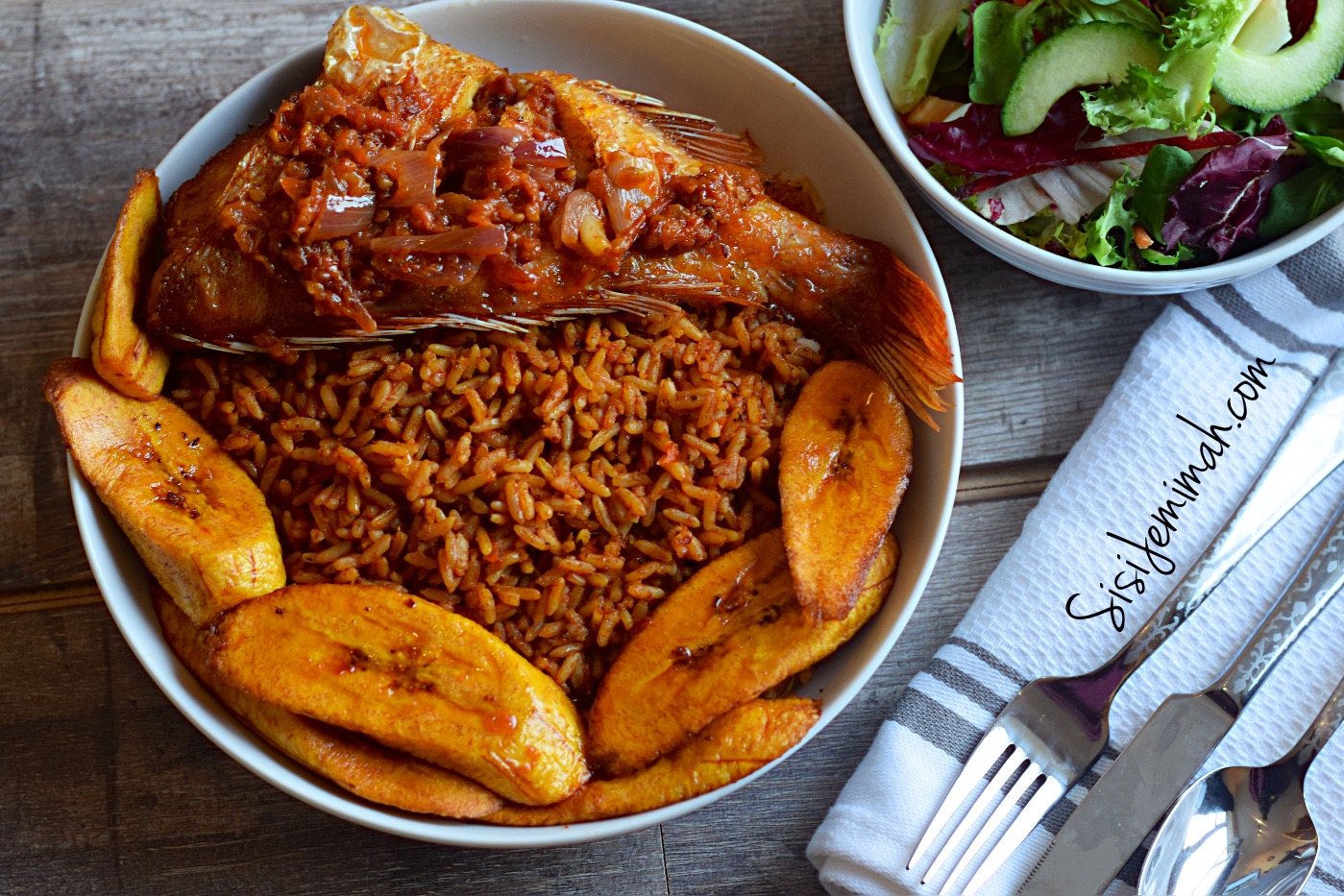 Savoring the iconic taste of Jollof rice – a dish that unites Nigeria in its deliciousness.