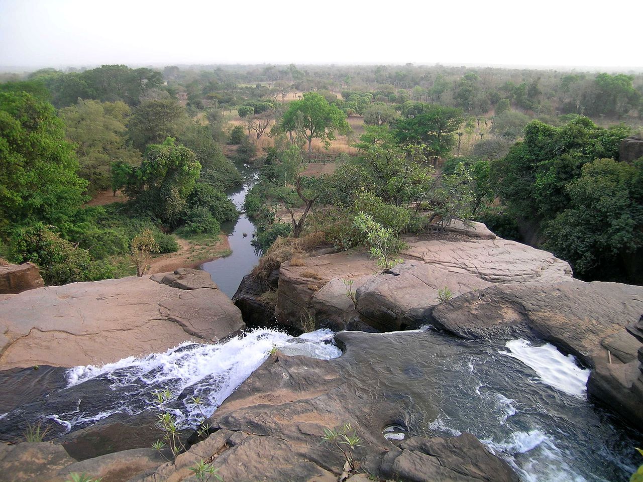 Experience the wonder of Karfiguela Falls in Burkina Faso! 🌊 Marvel at the majestic cascades and immerse yourself in the natural beauty of West Africa. Photo Credit: flickr.com