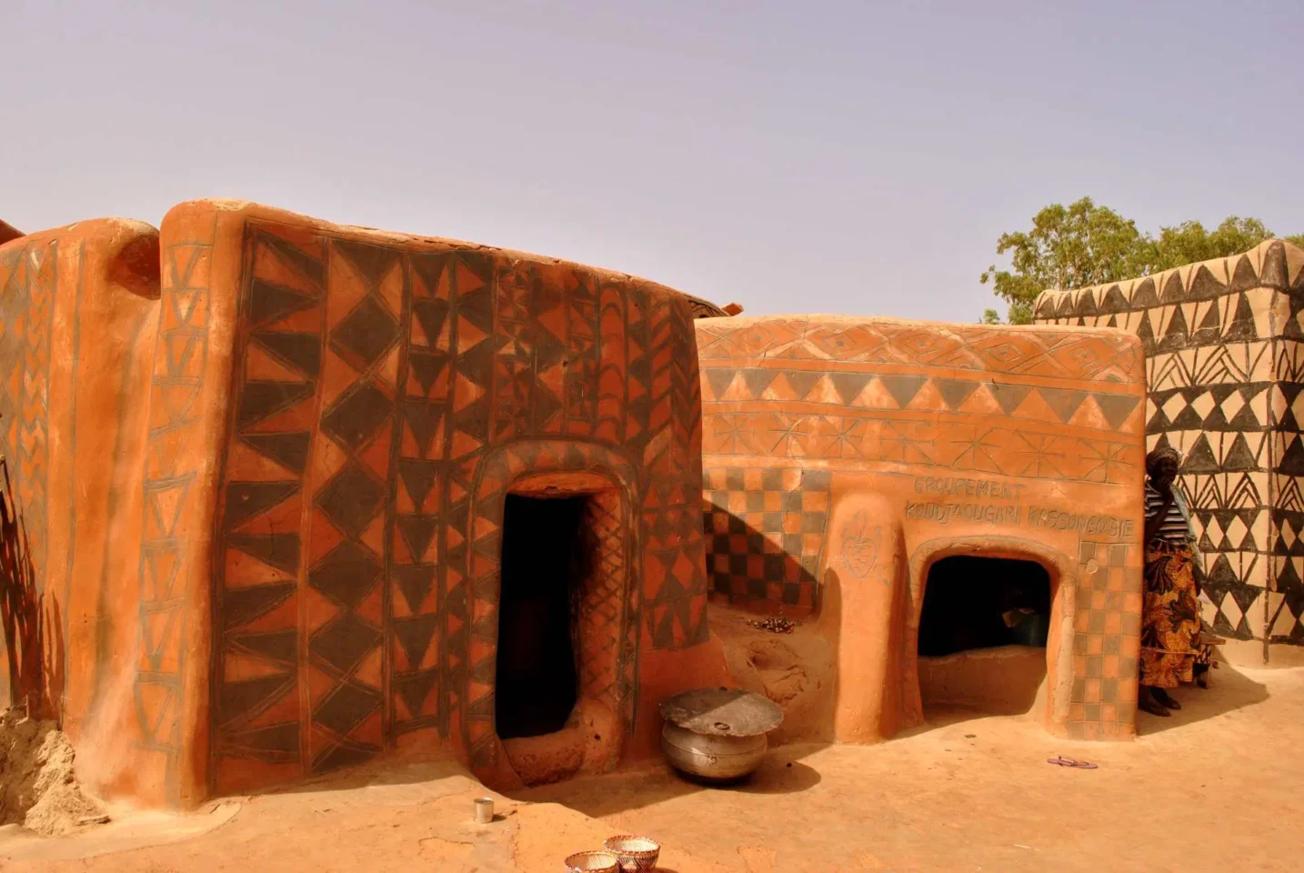 Step into the enchanting world of Tiebele Village in Burkina Faso! 🏡✨ Explore its unique architecture, vibrant culture, and rich traditions. #TiebeleVillage #BurkinaFaso. Photo Credit: fundacionio.com