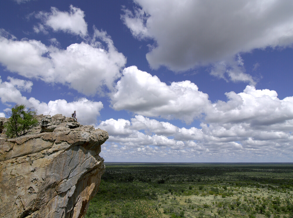 Tsodilo Hills: A UNESCO World Heritage Site in Botswana, adorned with over 4,500 ancient rock paintings spanning millennia. These quartzite formations rise from the Kalahari Desert, revealing captivating art, shelters, and caves. Photo Credit: unesco.org