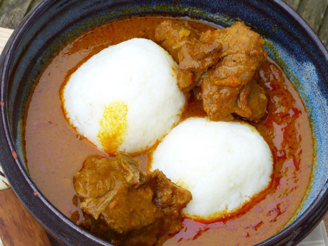 Omo tuo with palm nut soup. Photo Credit: aftradvillagekitchen.blogspot.com