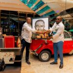 Dr. Ernest Ofori Sarpong presents a special gift to Dr. Osei Kwame Despite. Photo Credit: Despite Automobile Museum/Instagram