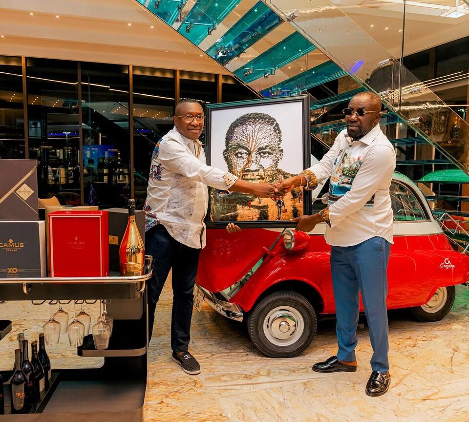 Dr. Ernest Ofori Sarpong presents a special gift to Dr. Osei Kwame Despite. Photo Credit: Despite Automobile Museum/Instagram