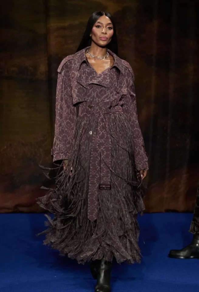 Touch up for Naomi Campbell at Burberry. Photo Credit: Africa Fashion Week London
