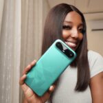 Angie Safo with the new TECNO CAMON Slim. Photo Credit: Angie Safo