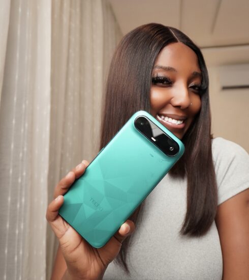 Angie Safo with the new TECNO CAMON Slim. Photo Credit: Angie Safo