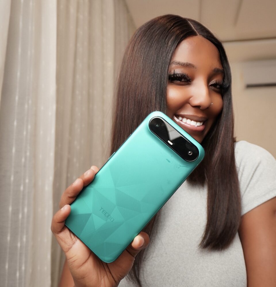 Angie Safo with the new TECNO CAMON Slim. Photo Credit: Angie Safo