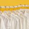 Hanged white clothes. Photo Credit: Washmart