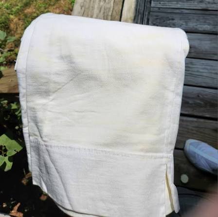 Yellow stains on white garment. Photo Credit Andi Mead/Facebook