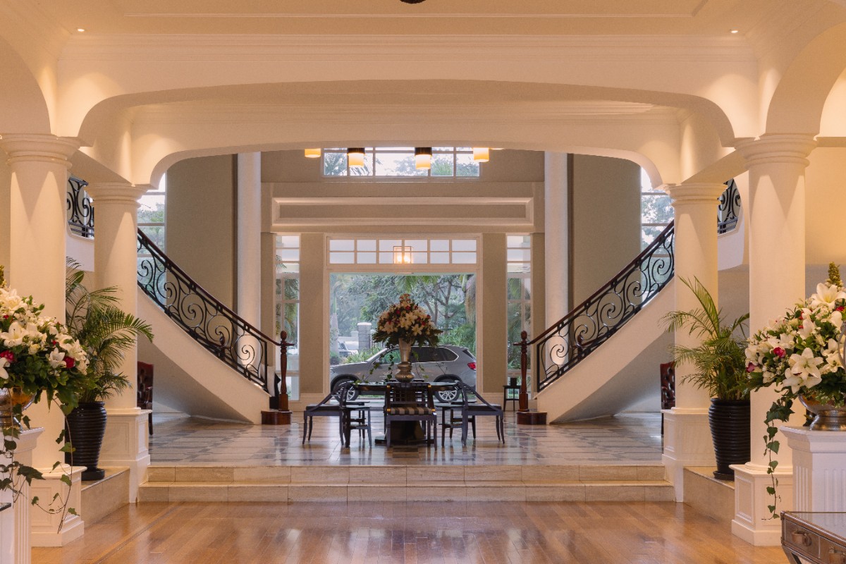 The grand arrival lobby of Hemingways Nairobi, blending classic architectural proportions with a welcoming residential atmosphere. Photo Credit: Hemingways Nairobi